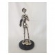 Don Quijote con escudo y libro